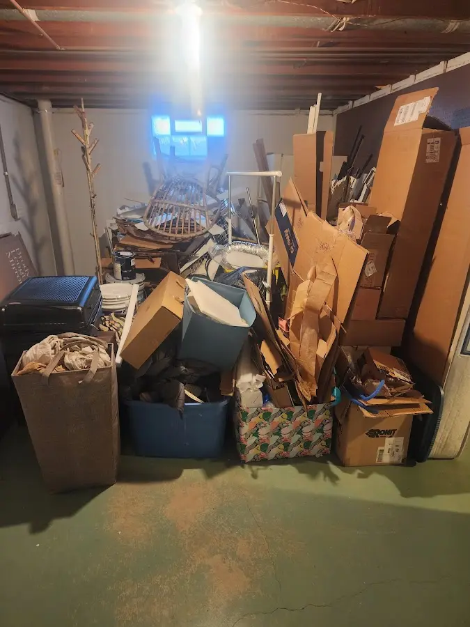 Roll-off dumpster container at job site for 15 Yard Dumpster Rental in Guttenberg